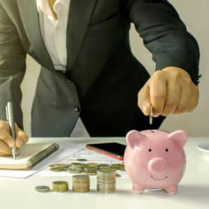saving money in piggy bank
