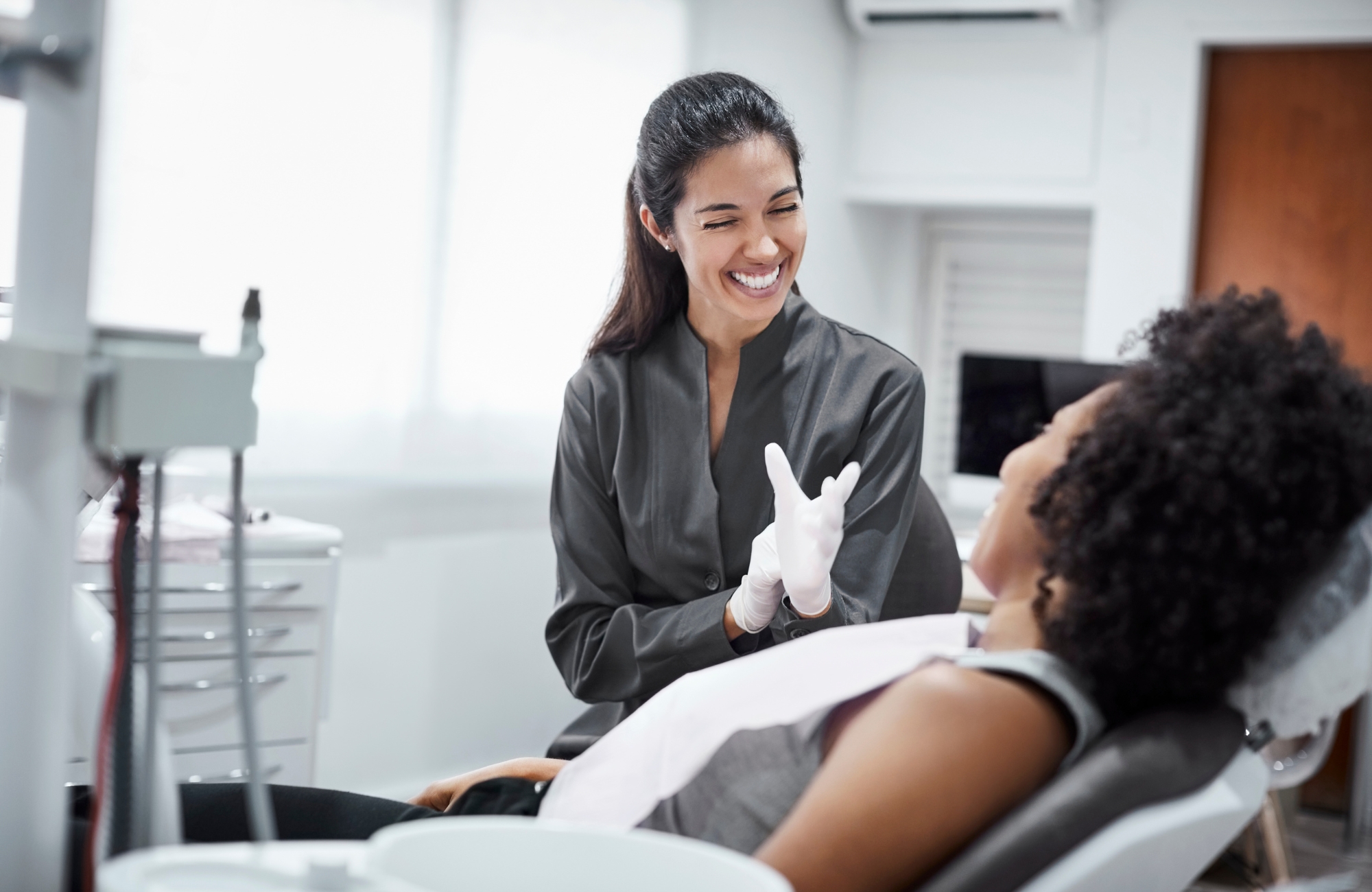 dentist-feature Smiling dentist and patient