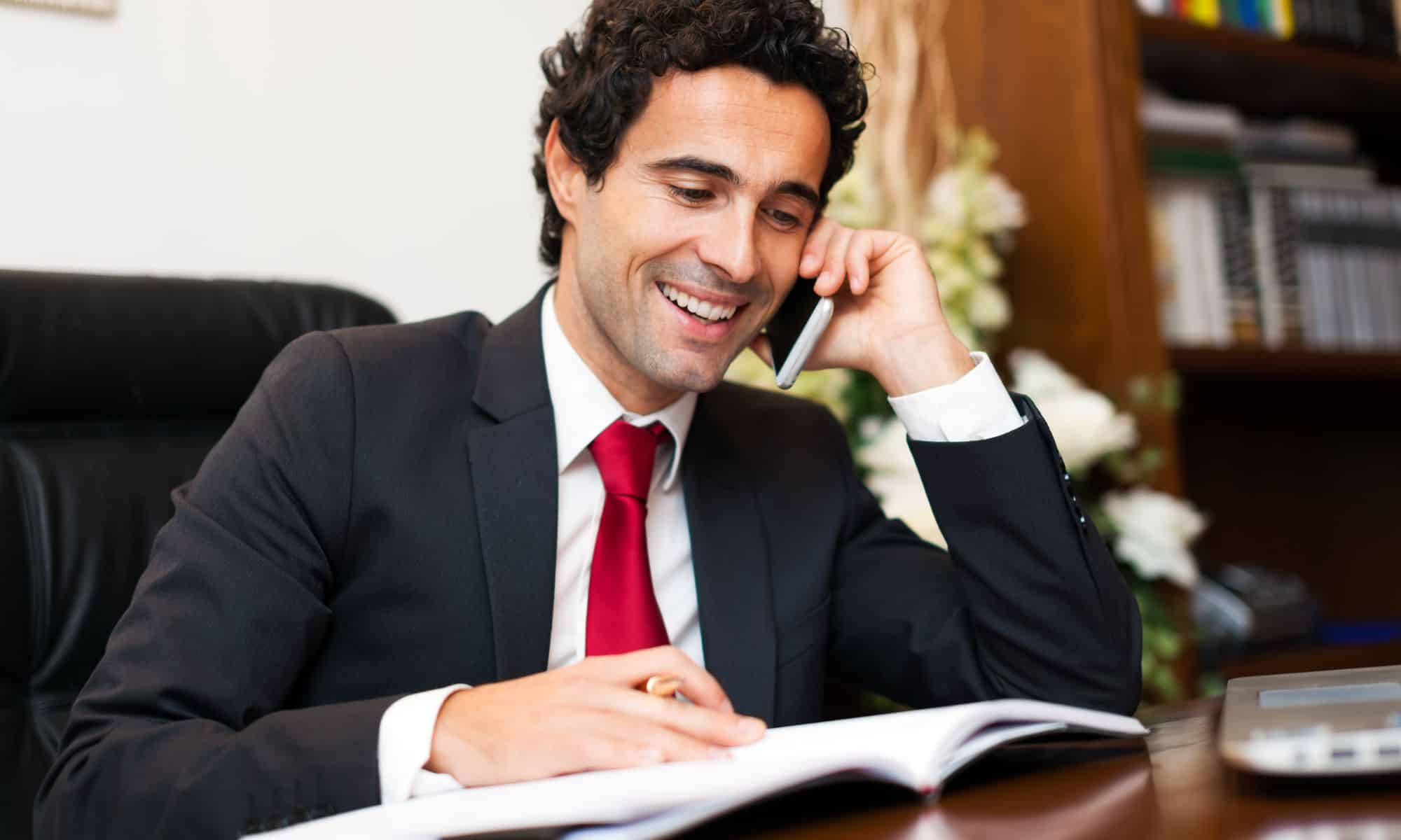 Law - Precision Phone Systems A woman on the phone at a desk
