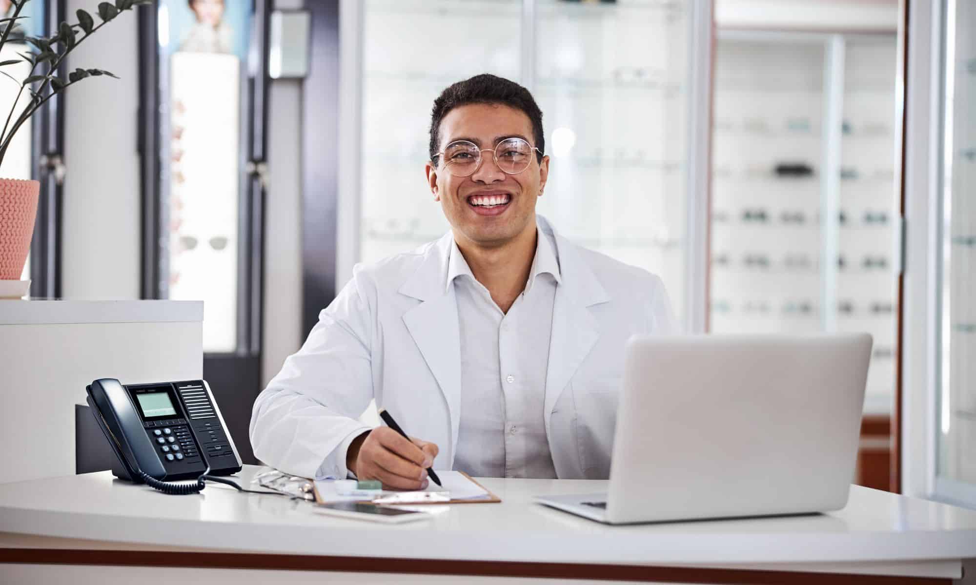 A woman on the phone at a desk