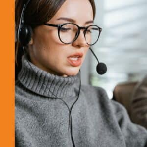 a women talking on the phone with a headset